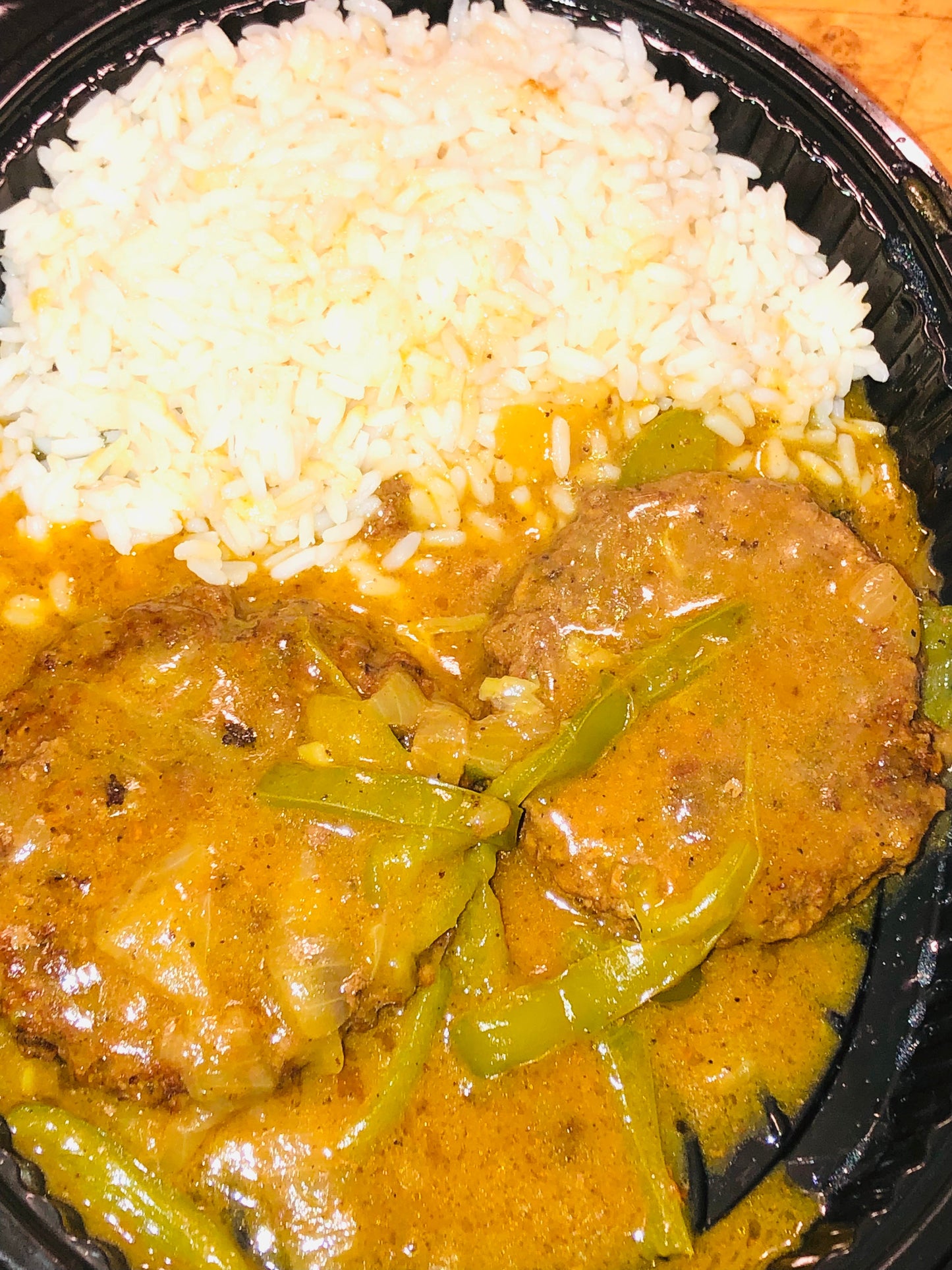 1/2 a Pan of Smothered Hamburgers in Gravy with Rice